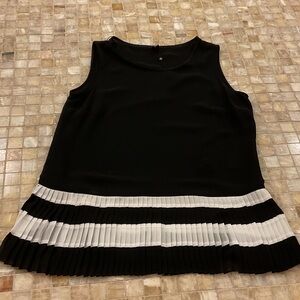 Basler Black Sleeveless Top with White Pleated Hem Accent. Size 38